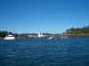 Looking out the cove entrance towards the field as a schooner passes